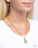 End Zone Elegance - Gold Football Necklace - Paparazzi Accessories