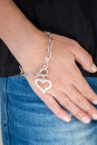 Paparazzi Accessories - March To A Different HEARTBEAT - White Bracelet